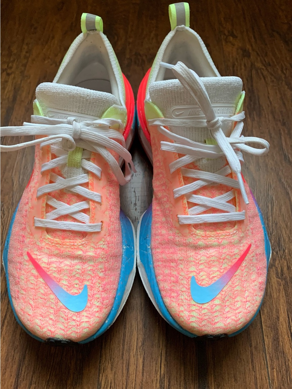 Nike Women's Neon Coral and Blue Flyknit Sneakers